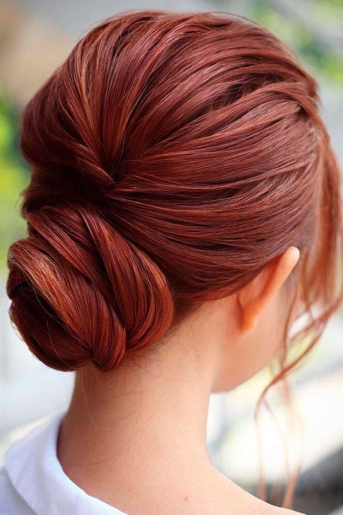 Copper Hair Color Ideas with Braided Low Bun